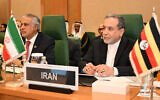 Iran's Foreign Minister Abbas Araghchi (R) and Pakistan's Foreign Minister Ishaq Dar attend an Extraordinary Session of the Council of Foreign Ministers of the Member States of The Organisation of Islamic Cooperation (OIC) in Jeddah on March 7, 2025 (Amer HILABI / AFP)