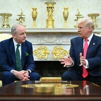 US President Donald Trump meets with Irish Prime Minister Micheal Martin in the Oval Office of the White House in Washington, DC, on March 12, 2025. (Photo by Mandel NGAN / AFP)