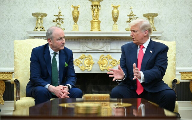 US President Donald Trump meets with Irish Prime Minister Micheal Martin in the Oval Office of the White House in Washington, DC, on March 12, 2025. (Photo by Mandel NGAN / AFP)