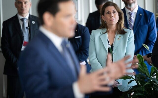 US State Department spokesperson Tammy Bruce listens as US Secretary of State Marco Rubio speaks with reporters following the G7 foreign ministers meeting in La Malbaie, Quebec, on March 14, 2025. (Photo by SAUL LOEB / POOL / AFP) US State Department spokesperson Tammy Bruce listens as US Secretary of State Marco Rubio speaks with reporters following the G7 foreign ministers meeting in La Malbaie, Quebec, on March 14, 2025. (Photo by SAUL LOEB / POOL / AFP)