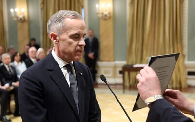 Canada's Prime Minister designate Mark Carney prepares for his swearing in ceremony at Rideau Hall on March 14, 2025, in Ottawa, Canada. (Dave Chan / AFP)