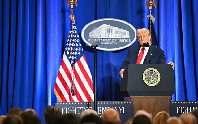 US President Donald Trump speaks at the Department of Justice in Washington, DC, on March 14, 2025. (ROBERTO SCHMIDT / AFP)