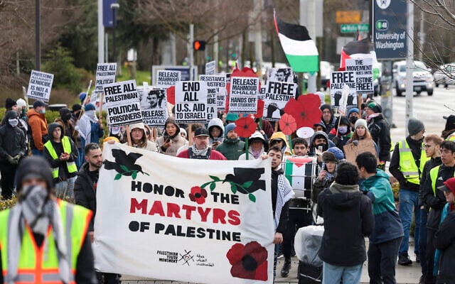 People hold signs as they protest the arrest of former Columbia University anti-Israel student activist Mahmoud Khalil during a 'Fight for Our Rights' demonstration at the University of Washington campus in Seattle, Washington, March 15, 2025. (Jason Redmond / AFP) People hold signs as they protest the arrest of former Columbia University anti-Israel student activist Mahmoud Khalil during a 'Fight for Our Rights' demonstration at the University of Washington campus in Seattle, Washington, March 15, 2025. (Jason Redmond / AFP)