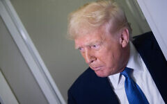 US President Donald Trump speaks to reporters aboard Air Force One while flying to Washington, DC, from Florida, on March 16, 2025, above Virginia. (Brendan Smialowski/AFP)