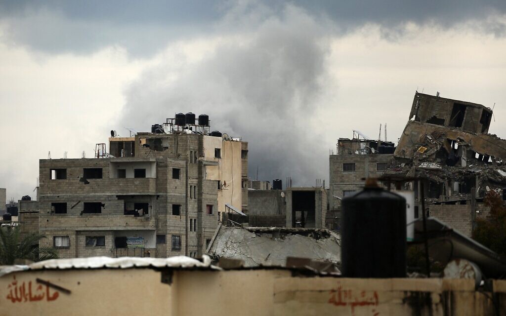 Smoke billows after an Israeli strike near the Bureij refugee camp in the central Gaza Strip on March 21, 2025. (Eyad BABA / AFP)