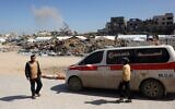 A plume of smoke erupts from a demolition carried out by Israeli forces on a Palestinian building in Beit Lahiya in the northern Gaza Strip on March 24, 2025. (Bashar Taleb/AFP)
