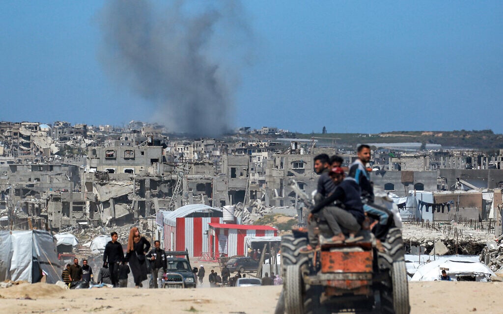 Smoke rises from Israeli shelling west of Beit Lahiya in the northern Gaza Strip on March 24, 2025. (BASHAR TALEB / AFP)