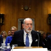 Former Arkansas Gov. Mike Huckabee, US President Donald Trump's nominee to be ambassador to Israel, arrives to testify during his Senate Foreign Relations Committee confirmation hearing at the Dirksen Senate Office Building on March 25, 2025 in Washington, DC. (Kevin Dietsch/Getty Images/AFP)