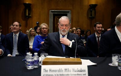 Former Arkansas Gov. Mike Huckabee, then US President Donald Trump's nominee to be ambassador to Israel, arrives to testify during his Senate Foreign Relations Committee confirmation hearing at the Dirksen Senate Office Building in Washington, DC, March 25, 2025. (Kevin Dietsch/Getty Images/AFP)