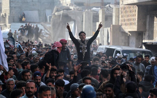 Palestinians take part in an anti-Hamas protest, calling for an end to the war with Israel, in Beit Lahiya in the northern Gaza Strip on March 26, 2025. (AFP)