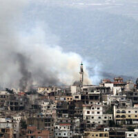 Smoke billows from the site of an Israeli strike in the southern Lebanese village of Khiam, on March 28, 2025. (Rabih Daher/AFP)