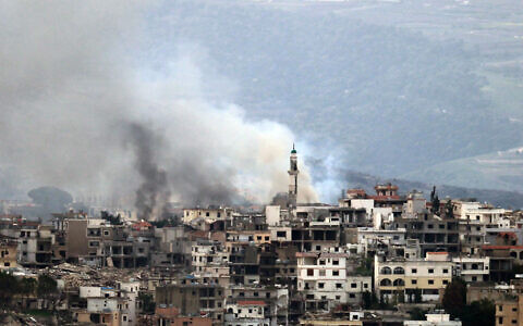Smoke billows from the site of an Israeli strike in the southern Lebanese village of Khiam, on March 28, 2025. (Rabih Daher/AFP)