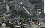 Rescue teams are seen at a construction site where a building collapsed in Bangkok, Thailand, on March 28, 2025, after an earthquake. (Lillian Suwanrumpha / AFP)