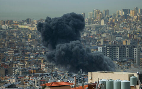 Smoke rises from the site of an Israeli strike in southern Beirut on March 28, 2025. (IBRAHIM AMRO / AFP)