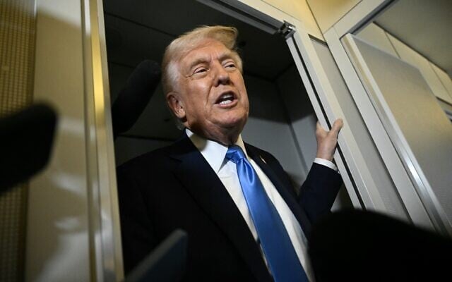 US President Donald Trump speaks to the press aboard Air Force One before arriving at Palm Beach International Airport in West Palm Beach, Florida, on March 28, 2025 (Brendan SMIALOWSKI / AFP) US President Donald Trump speaks to the press aboard Air Force One before arriving at Palm Beach International Airport in West Palm Beach, Florida, on March 28, 2025 (Brendan SMIALOWSKI / AFP)