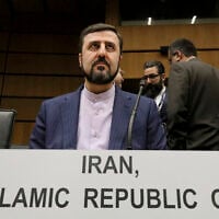 In this Nov. 21, 2019 file photo Iran's Ambassador to the International Atomic Energy Agency, IAEA, Kazem Gharibabadi, waits for the start of the IAEA board of governors meeting at the International Center in Vienna, Austria (AP Photo/Ronald Zak, file)