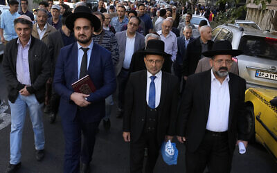 Iranian rabbis and Jewish community members attend an anti-Israel gathering in the wake of the October 7 Hamas-led massacre, in Tehran, Iran, October 30, 2023. (AP Photo/Vahid Salemi) Iranian rabbis and Jewish community members attend an anti-Israel gathering in the wake of the October 7 Hamas-led massacre, in Tehran, Iran, October 30, 2023. (AP Photo/Vahid Salemi)