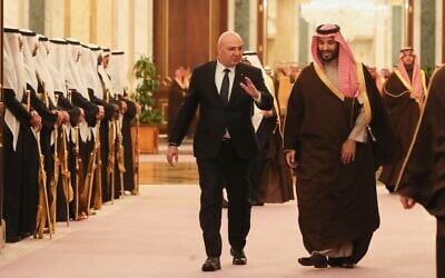 Saudi's Crown Prince Mohammed bin Salman accompanies Lebanese President Joseph Aoun, left, upon his arrival to the Royal Palace in Riyadh, Saudi Arabia, March 3, 2025. (Lebanese Presidency press office via AP)