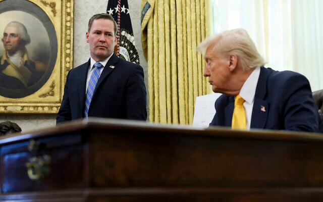 White House National Security Adviser Mike Waltz, left, listens as US President Donald Trump speaks in the Oval Office of the White House in Washington, March 7, 2025. (Pool via AP) White House National Security Adviser Mike Waltz, left, listens as US President Donald Trump speaks in the Oval Office of the White House in Washington, March 7, 2025. (Pool via AP)