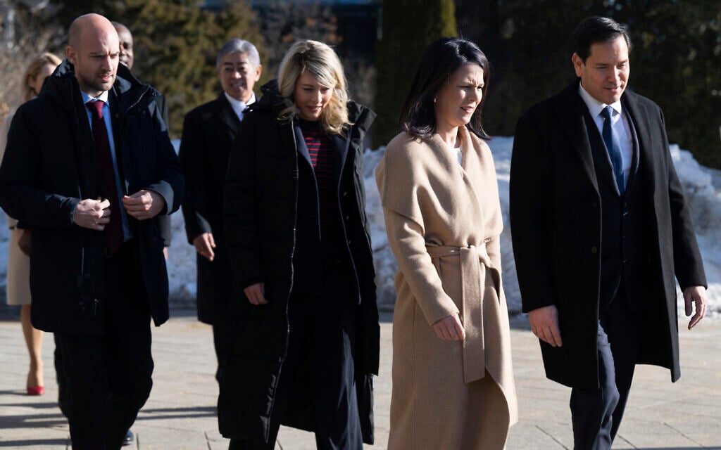 From left: French Foreign Minister Jean-Noel Barrot, Canadian Foreign Minister Melanie Joly, German Foreign Minister Annalena Baerbock and US Secretary of State Marco Rubio arrive for the family photo during the G7 foreign ministers meeting in La Malbaie, Canada, Friday March 14, 2025. (Saul Loeb, Pool Photo via AP)