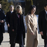 From left: French Foreign Minister Jean-Noel Barrot, Canadian Foreign Minister Melanie Joly, German Foreign Minister Annalena Baerbock and US Secretary of State Marco Rubio arrive for the family photo during the G7 foreign ministers meeting in La Malbaie, Canada, Friday March 14, 2025. (Saul Loeb, Pool Photo via AP)