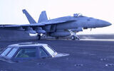 This image taken from video provided by the US Navy shows an aircraft launching from the USS Harry S. Truman in the Red Sea before airstrikes in Sanaa, Yemen, March 15, 2025. (US Navy via AP)