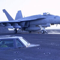 This image taken from video provided by the US Navy shows an aircraft launching from the USS Harry S. Truman in the Red Sea before airstrikes in Sanaa, Yemen, March 15, 2025. (US Navy via AP)