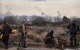 Syrian troops take position in the village of Hawsh al-Sayyid Ali, located 2 km (1.24 miles) from the Lebanon border, Syria, March 17, 2025. (AP Photo/Omar Albam)