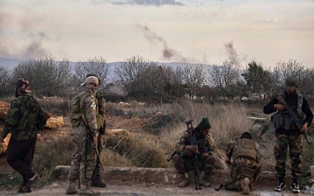 Syrian troops take position in the village of Hawsh al-Sayyid Ali, located 2 km (1.24 miles) from the Lebanon border, Syria, March 17, 2025. (AP Photo/Omar Albam) Syrian troops take position in the village of Hawsh al-Sayyid Ali, located 2 km (1.24 miles) from the Lebanon border, Syria, March 17, 2025. (AP Photo/Omar Albam)