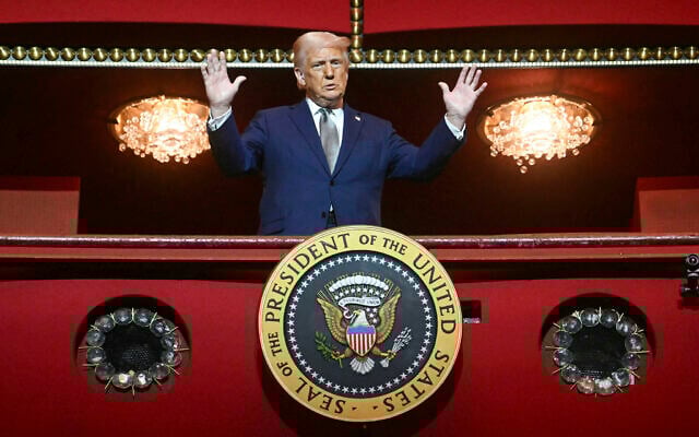 US President Donald Trump stands in the presidential box as he tours the John F. Kennedy Center for the Performing Arts in Washington, Monday, March 17, 2025. (Pool via AP) US President Donald Trump stands in the presidential box as he tours the John F. Kennedy Center for the Performing Arts in Washington, Monday, March 17, 2025. (Pool via AP)