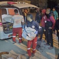 An ambulance carrying victims of an Israeli army strike arrives at the hospital in Khan Younis, southern Gaza Strip, Tuesday March 18, 2025.(AP Photo/ Mohammad Jahjouh)