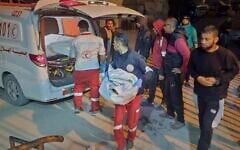 An ambulance carrying victims of an Israeli army strike arrives at the hospital in Khan Younis, southern Gaza Strip, Tuesday March 18, 2025.(AP Photo/ Mohammad Jahjouh)