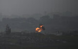 An explosion erupts in the northern Gaza Strip, as seen from southern Israel, on Tuesday, March 18, 2025. (AP Photo/Leo Correa)