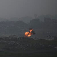 An explosion erupts in the northern Gaza Strip, as seen from southern Israel, on Tuesday, March 18, 2025. (AP Photo/Leo Correa)