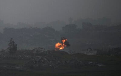 An explosion erupts in the northern Gaza Strip, as seen from southern Israel, on Tuesday, March 18, 2025. (AP Photo/Leo Correa)