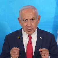 In this image made from a video released by the Israeli Government Press Office, Prime Minister Benjamin Netanyahu gives a statement Tuesday, March 18, 2025, in Tel Aviv, Israel. (Government Press Office via AP)