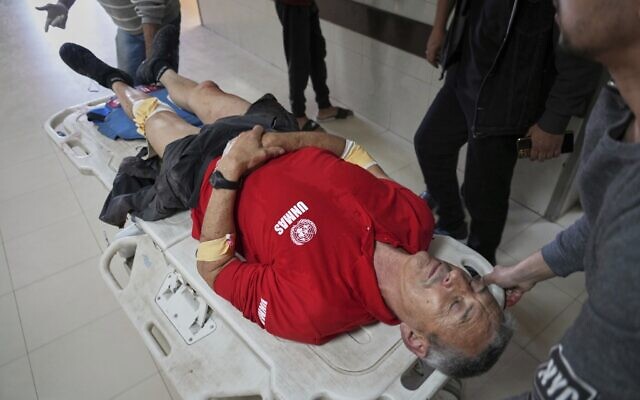 An injured United Nations Mine Action Service (UNMAS) worker is taken into the al-Aqsa Martyrs hospital after an explosion in Gaza, Wednesday March 19, 2025.(AP Photo/Abdel Kareem Hana) An injured United Nations Mine Action Service (UNMAS) worker is taken into the al-Aqsa Martyrs hospital after an explosion in Gaza, Wednesday March 19, 2025.(AP Photo/Abdel Kareem Hana)