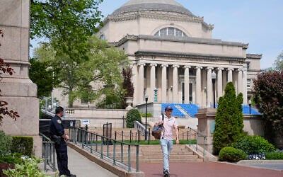 A New York City police officer keeps watch on the campus of Columbia University in New York, Monday, May 6, 2024.  (AP/Seth Wenig)