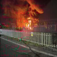 This photo provided by London Fire Brigade, shows a fire at the North Hyde electrical substation, which caught fire Thursday night and lead to a closure of Heathrow Airport in London, Friday, March 21, 2025. (London Fire Brigade via AP)
