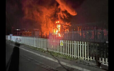 This photo provided by London Fire Brigade, shows a fire at the North Hyde electrical substation, which caught fire Thursday night and lead to a closure of Heathrow Airport in London, Friday, March 21, 2025. (London Fire Brigade via AP)