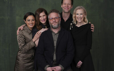 Left to right: Chase Sui Wonders, Kathryn Hahn, Seth Rogen, Ike Barinholtz and Catherine O'Hara, cast members in the Apple TV+ series 'The Studio,' pose together on Thursday, March 20, 2025, in Los Angeles. (AP Photo/Chris Pizzello)