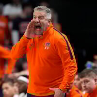 Auburn head coach Bruce Pearl yells towards his players during the second half in the second round of the NCAA college basketball tournament against Creighton, Saturday, March 22, 2025, in Lexington, Ky. (AP Photo/Brynn Anderson)