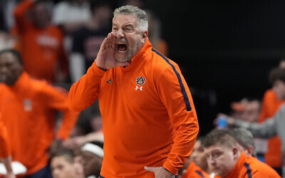 Auburn head coach Bruce Pearl yells towards his players during the second half in the second round of the NCAA college basketball tournament against Creighton, Saturday, March 22, 2025, in Lexington, Ky. (AP Photo/Brynn Anderson)