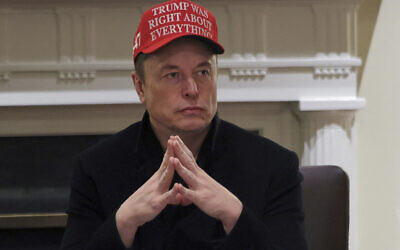 Elon Musk attends a cabinet meeting at the White House in Washington, March 24, 2025. (Pool via AP)