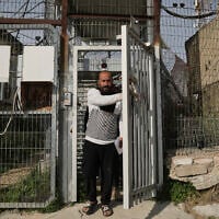 Hamdan Ballal, Oscar-winning Palestinian director of 'No Other Land,' is released from a police station in the West Bank settlement of Kiryat Arba after being detained by the Israeli army following an alleged attack by Jewish settlers, March 25, 2025. (AP/Leo Correa)