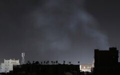 Smoke rises from a location reportedly struck by US airstrikes in Sanaa, Yemen, March 26, 2025. (AP Photo)