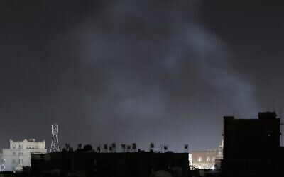 Smoke rises from a location reportedly struck by US airstrikes in Sanaa, Yemen, March 26, 2025. (AP Photo)