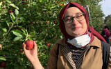 This contributed photo shows Rumeysa Ozturk on an apple-picking trip in 2021.  (AP Photo)