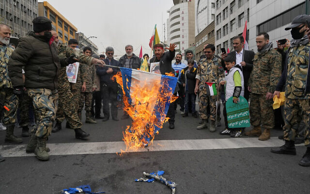 Iranian demonstrators burn an Israeli flag during the annual anti-Israeli Quds Day, or Jerusalem Day rally, in Tehran, Iran, March 28, 2025. (AP Photo/Vahid Salemi) Iranian demonstrators burn an Israeli flag during the annual anti-Israeli Quds Day, or Jerusalem Day rally, in Tehran, Iran, March 28, 2025. (AP Photo/Vahid Salemi)