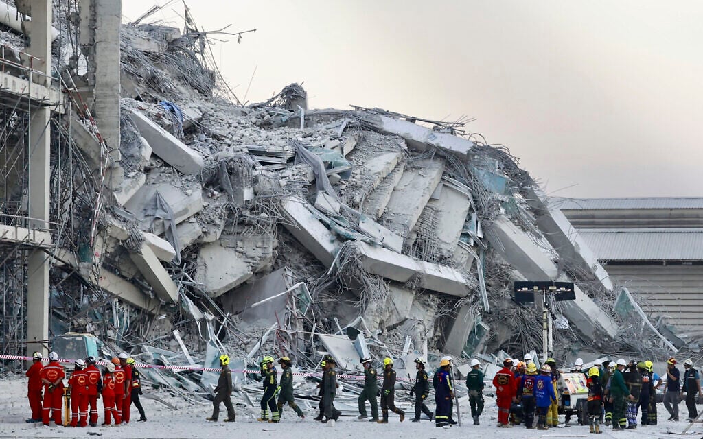 Rescuers work at the site a high-rise building under construction that collapsed after a 7.7 magnitude earthquake in Bangkok, Thailand, Friday, March 28, 2025. (AP Photo/Wason Wanichakorn)